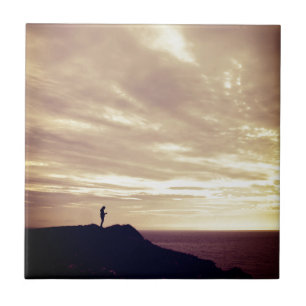 Penard penf no pôr do sol, Gower, Swansea