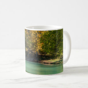 Pequena caneca de café de ouro