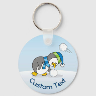 Pequeno pinguim ganhando um Chaveiro de bola de ne