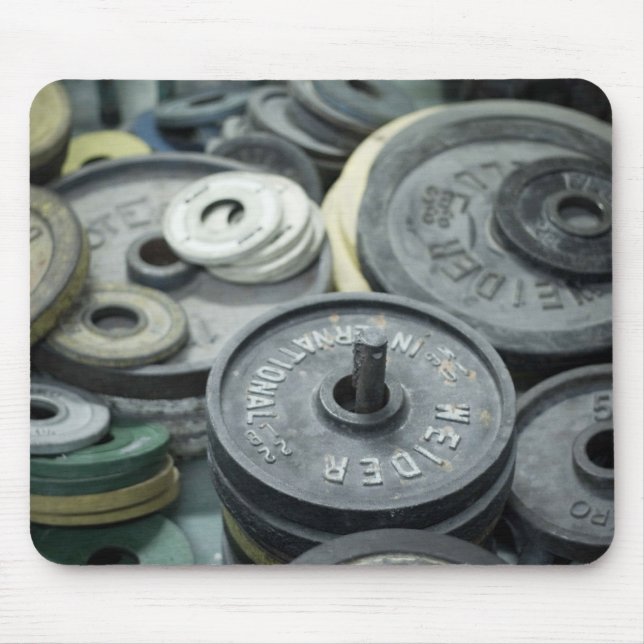 Pesos do metal dispersados em torno do mousepad (Frente)