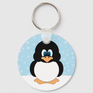 Pinguim com chaveiro dos flocos de neve