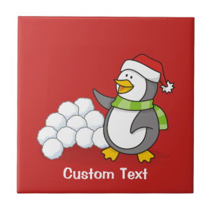 Pinguim de Natal com bolas de neve balançando