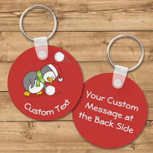 Pinguim Natal ganhando uma Chaveiro de bola de nev