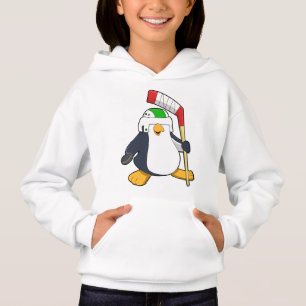Pinguim no hóquei no gelo com bastão de hóquei