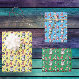 Pinguins de Natal bonitos em verde-amarelo e azul