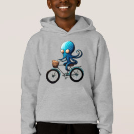 Polvo azul fofo em uma bicicleta