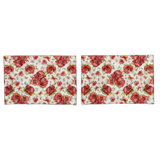 Poppies vermelhos com folhagem verde em fundo bran
