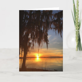 pôr do sol no cartão de saudação do lago