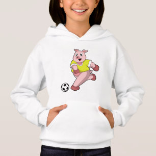 Porco como jogador de futebol com bola de futebol