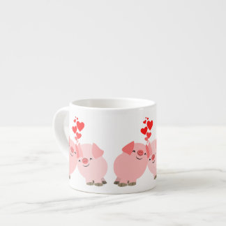 Porcos bonitos dos desenhos animados na caneca do