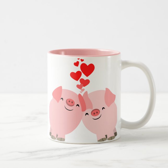 Porcos bonitos dos desenhos animados na caneca do (Direita)