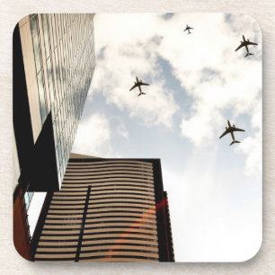 Porta-copo Aviões que voam sobre construções