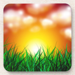 Porta-copo Belo nascer do sol sobre um campo de grama