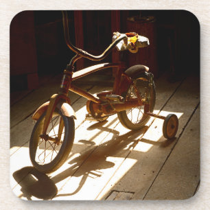 Porta-copo Bicicleta infantil no antigo moinho de grãos