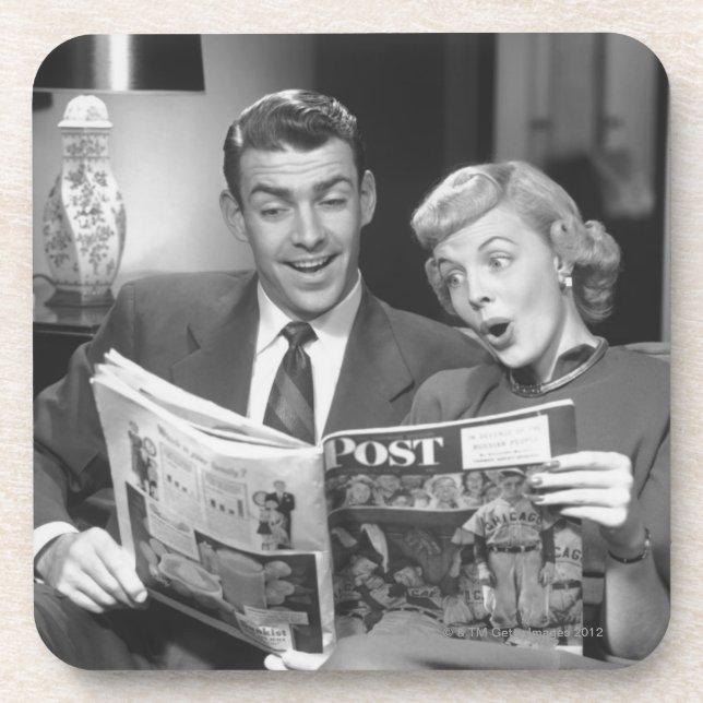 Porta-copo Compartimento da leitura do casal (Frente)