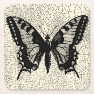 Porta-copo De Papel Quadrado Borboleta Preta e Branca sobre fundo rachado