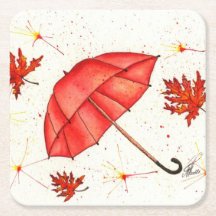 Guarda-chuva vermelha brilhante e folhas vermelhas