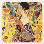 Porta-copo De Papel Quadrado Gustav Klimt Lady com ventilador<br><div class="desc">Portas copos de papel com a pintura a óleo de Gustav Klimt Lady com ventilador (1918). Uma mulher vestindo um quimono azul segura um fã vermelho contra um fundo amarelo colorido de flores e pavões. Um presente de excelente para fãs de arte japonesa e europeia.</div>