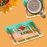 Porta-copo De Papel Quadrado Palm Trees e Uprights de Futebol<br><div class="desc">Os super-fãs de PORTAS COPOS pesadas de polpa de papel do dia de futebol adorarão apresentar palmeiras e um futebol navegando pelas miras. Perfeito para o grande jogo de 13 de fevereiro de 2022 em Los Angeles. CONVITES DE FESTAS,  pratos,  guardanapos e mais na nossa loja.</div>