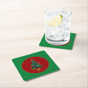 Porta-copo De Papel Quadrado Uma árvore de Natal cintilante em um fundo verde