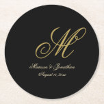 Porta-copo De Papel Redondo Casamento Preto com Script Monograma Dourado Chic<br><div class="desc">Estas elegantes portas copos de papel de casamento de monograma preto adicionarão um toque de classe às suas configurações de casamento. O modelo de design chic apresenta a inicial do monograma do sobrenome do noivo junto com os primeiros nomes da noiva e do noivo e a data do casamento em...</div>
