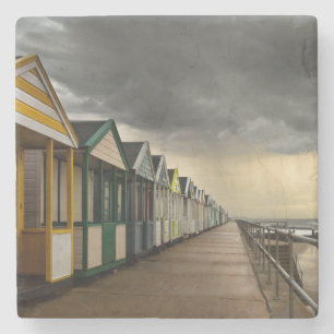 Porta-copo De Pedra Cabanas da praia em uma tempestade Southwold do