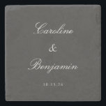 Porta-copo De Pedra Nome Personalizado de Casamento Elegante de Script<br><div class="desc">Celebre seu dia especial com essa porta copos de pedra personalizada, apresentando um design minimalista que exumenta a elegância do eterno. Perfeito para casamentos ou aniversários, esta porta copos mostra seus nomes e datas em um roteiro delicado contra uma cinza natural de ardósia, oferecendo uma manutenção sofisticada e funcional. Ideal...</div>