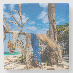 Porta-copo De Pedra Redes de pesca que secam na praia