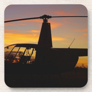 Porta-copo helicóptero Robinson R44 ao pôr do sol