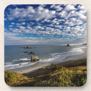 Porta-copo Nuvens matinais e nevoeiro na praia