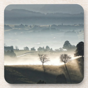Porta-copo Paisagem campestre nebulosa da Suíça