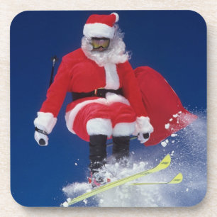 Porta-copo Papai Noel no salto de esquis fora de um cornice
