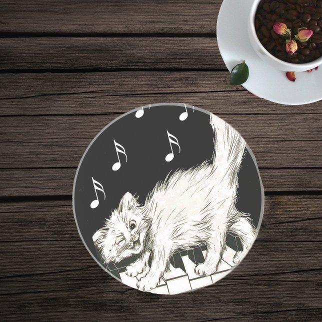 Porta-copos Gato Branco em Chaves Piano (White winking cat on piano keys on black with white music notes glass drink coaster.)