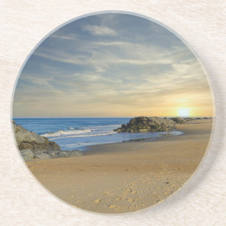 Porta-copos Levantamento do sol em uma costa arenosa