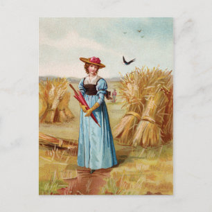 Postal A mulher no cartão do campo de trigo