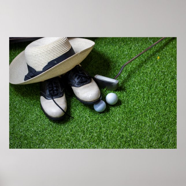 Poster As bolas de golfe estão na grama verde (Frente)