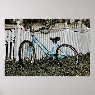 Poster Bicicleta de turquesa que inclina-se em uma cerca