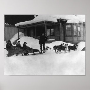 Poster Family traveling by Dog Sled in Alaska