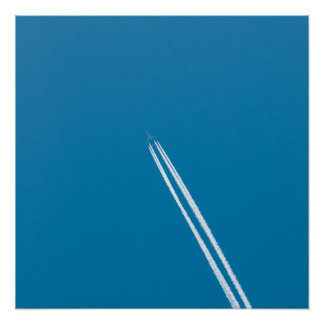 Pôster Flying airplane on a blue sky background