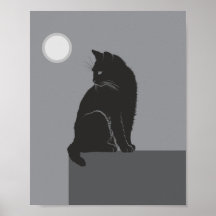 gato preto sentado na mesa