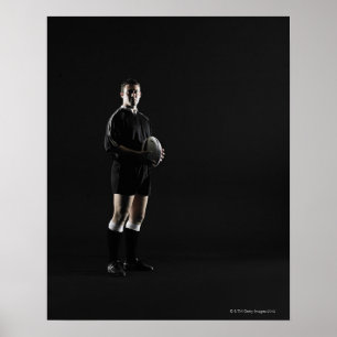 Pôster Homem novo que guardara a bola de rugby, retrato