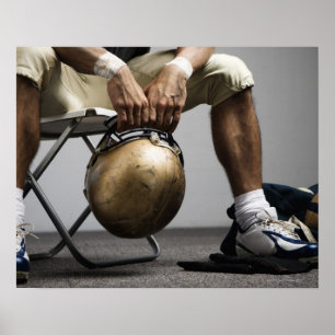 Pôster Jogador de futebol sentado no vestiário