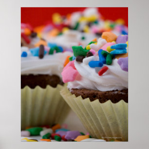 Poster Os cupcakes do chocolate com crosta de gelo e