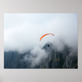 Poster Paraglider Soaring Over Foggy Mountain Cliff