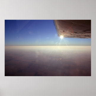 Pôster Pôrs do sol sob Wing