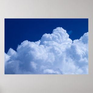 Poster Puffy clouds in blue sky