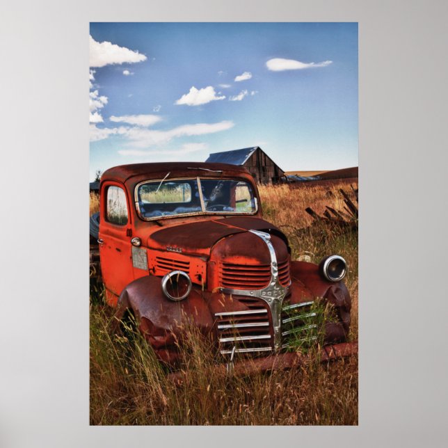 Pôster Rusting orange Dodge truck with abandoned farm (Frente)