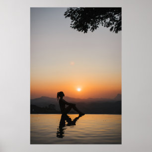 Poster Silhouette de uma mulher sentada no limite da eter