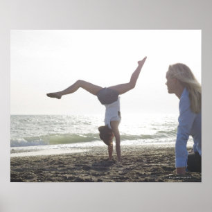 Poster Teenage girl performs gymnastic feat, mom
