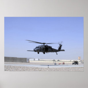Poster Um HH-60G pavimenta o falcão que descola do